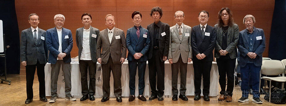 新入会員の皆さん (左より)水森理事長、徳久会長、石塚岳春、小松正道、川原伸一、佐藤伸行、宮木凱征、佐藤保徳、牧野将典、岡副会長
